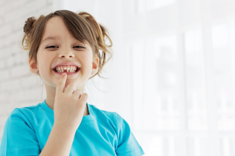 Young patient smiling after losing baby teeth